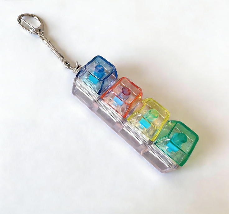 Light-emitting Portable Multifunctional Keyboard Keychain Fidget Toy with Light, Finger Press Stress Relief Gadget, All-Age Gift